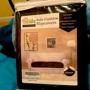 Black sofa slip covers.